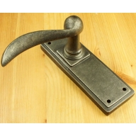 pewter/bronze wave style lever on plate
