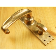 ornate style lever on bathroom plate